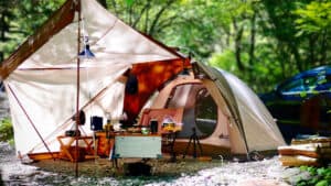 The Ultimate Camping Checklist: Must-Have Gear for Car Camping (Tested Picks) 2 car tent camping set up with essential camping gear