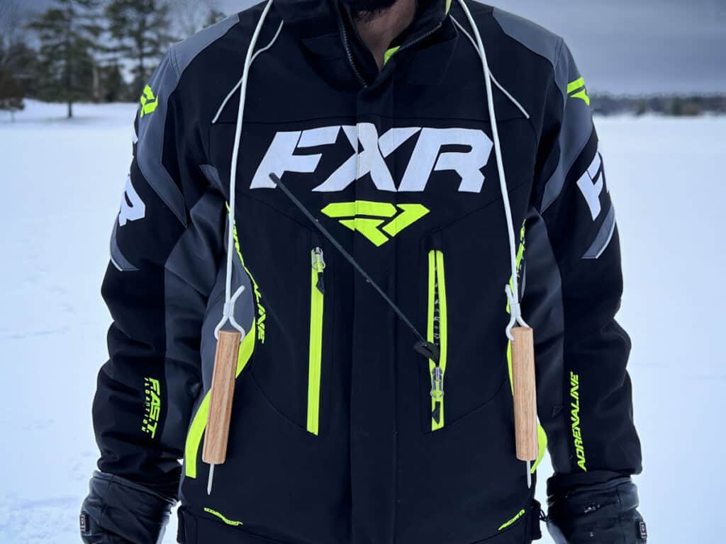 Wearing an FXR FAST jacket, non-retractable safety ice picks for ice fishing and carrying a ham radio