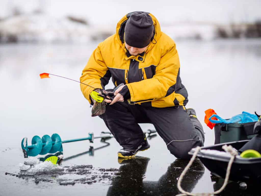 Ice Fishing on a Frozen Lake