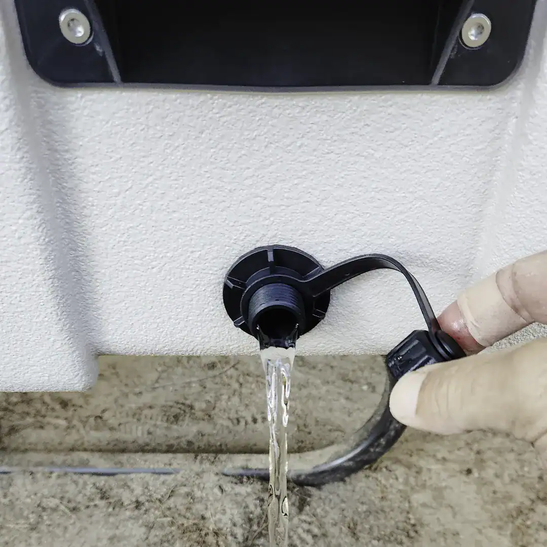 water draining from the drain plug on the rugged road 45 cooler