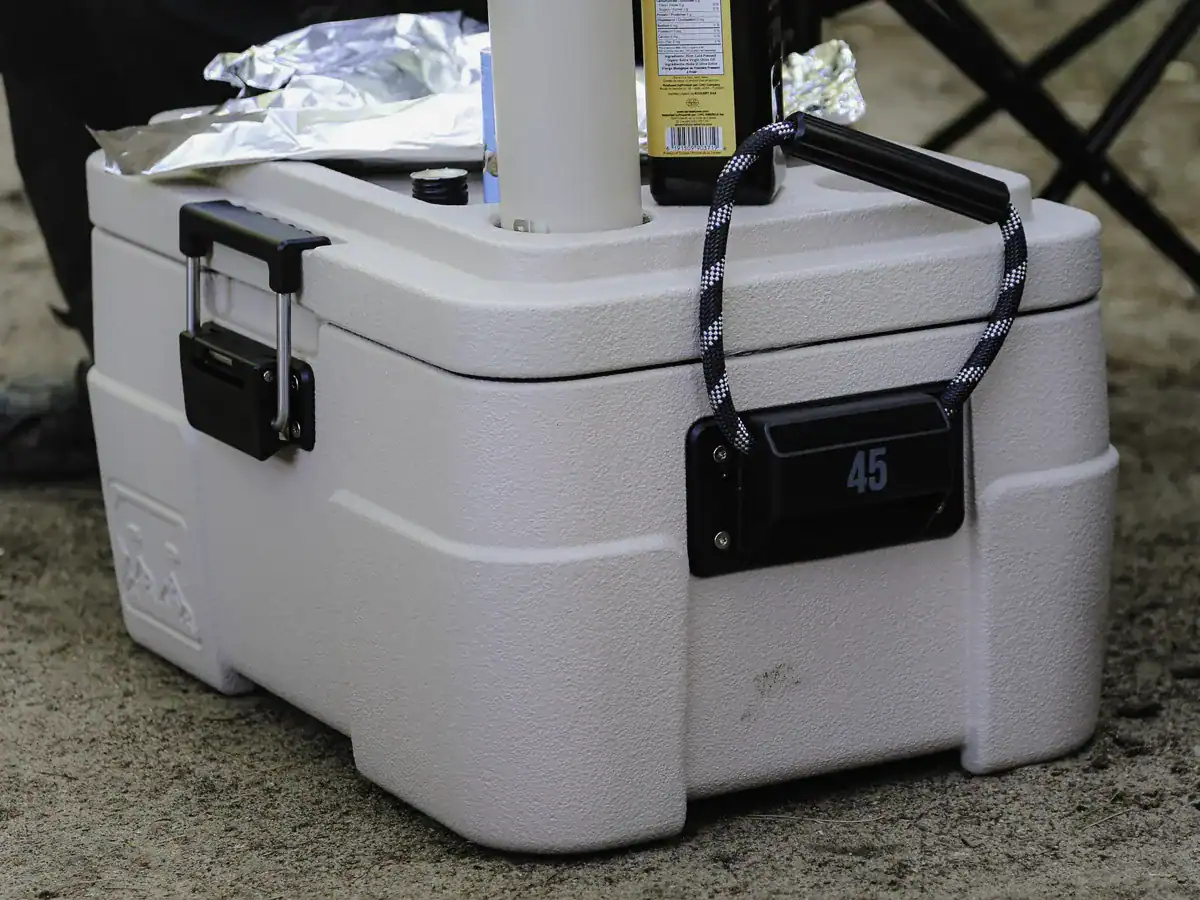 close-up of the Rugged Road 45 portable cooler grab handle and locking mechanism