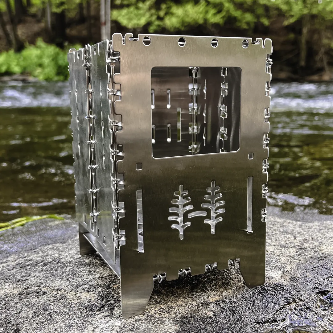 Backcountry stove from the Bespoke subscription box perched on a rock