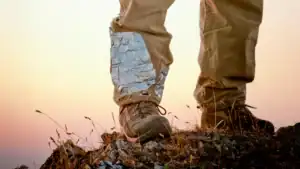 Hiker wearing hiking pants with duct tape on them