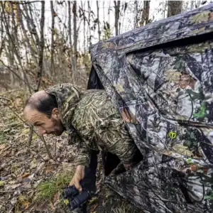 hunter exiting the TideWe VisST ground blind