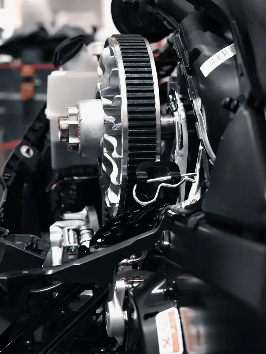 close up of the drive belt on a snowmobile - part of snowmobile maintenance