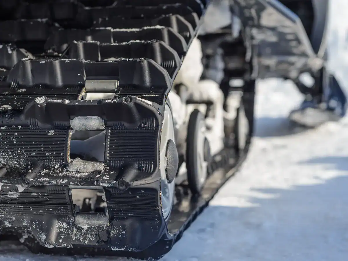snowmobile track inspection part of pre-season maintenance