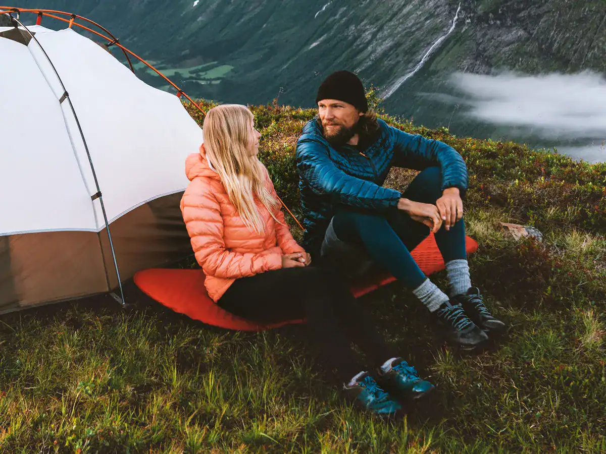 a couple camping in the mountains on Valentine's Day
