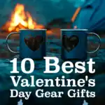 two heart engraved mugs beside a campfire at a campsite on Valentine's Day