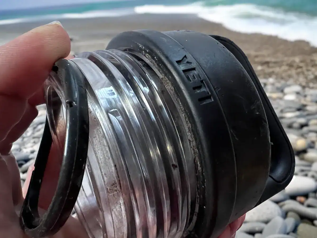 Best Water Bottles for Hiking & Camping: How to Choose (+ Our Tested Picks) 4 holding a YETI Chug Cap filled with grime and mildew under the seals