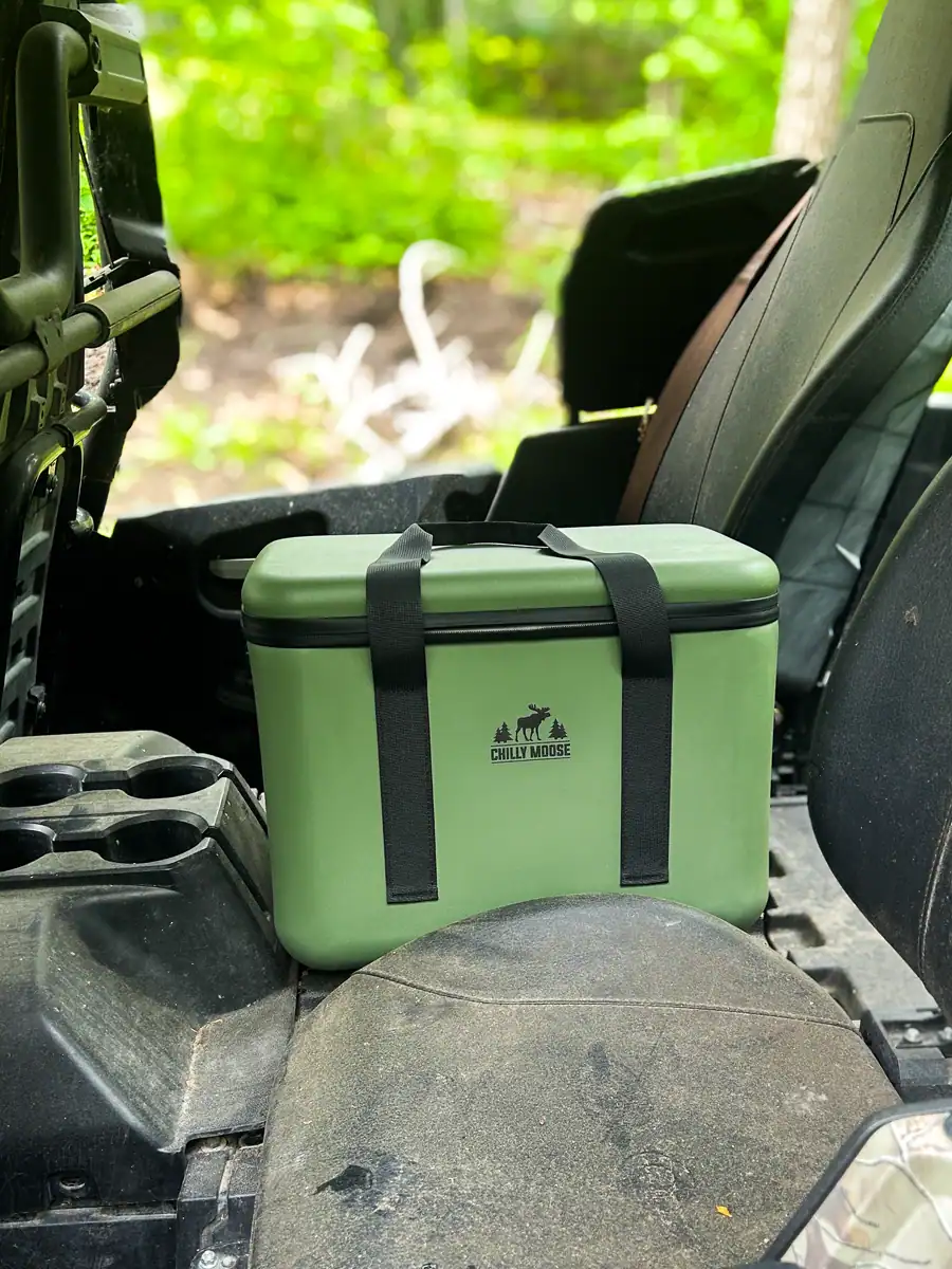 Chilly Moose Coolers Review: Bowen vs Harbour Bucket vs Explorer (Tested) 8 Chilly Moose 16L Bowen Cooler in Ollive sitting inbetwen two seats in our Yamaha SxS