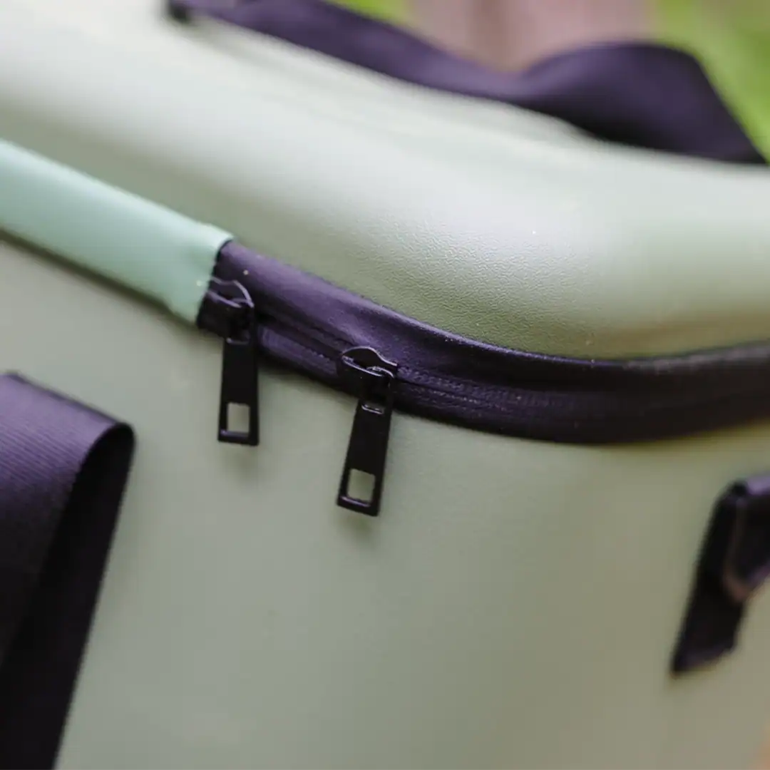 Chilly Moose Coolers Review: Bowen vs Harbour Bucket vs Explorer (Tested) 5 closeup of the large zippers on the 16L Bowen soft-side Chilly Moose Cooler in olive