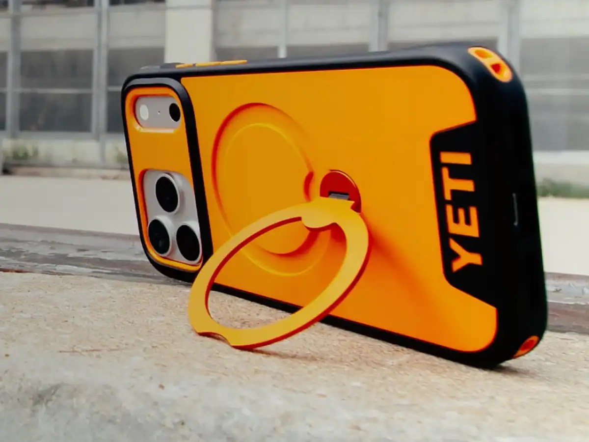 YETI’s NEW LoadOut Phone Case: Military-grade Protection for Your iPhone 1 yeti loadout phone case in king crab orange with the kickstand out