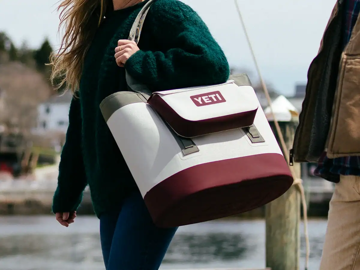 YETI's New Riverhead Collection: A Tweed-Textured Twist for Fall 2 woman carrying the 35L Camino CarryAll Tote bag in the new riverhead collection colours