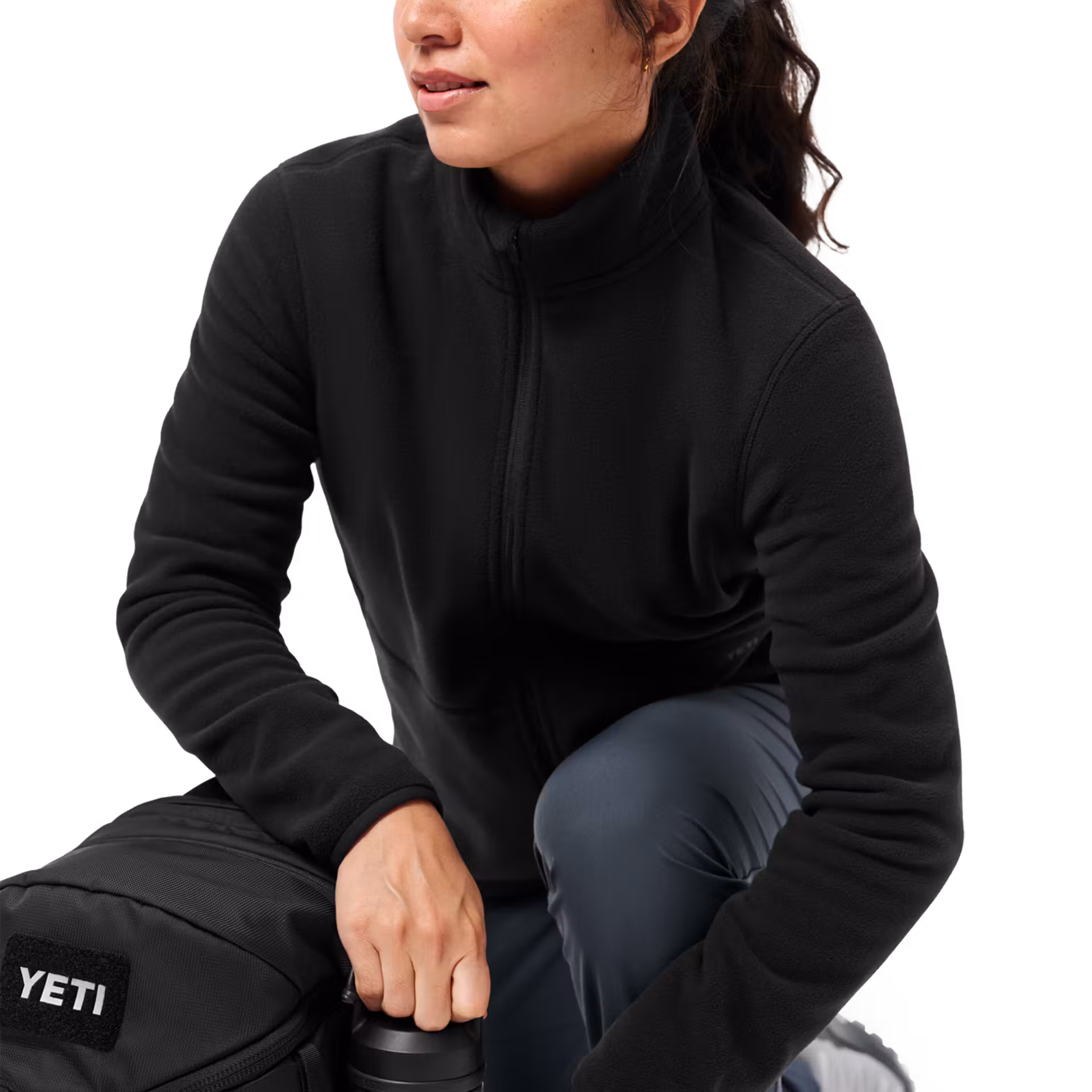 YETI Performance Apparel: Jackets, Fleece & Merino Compared 3 woman wearing YETI's newest in performance apparel: Sansaba fleece in black